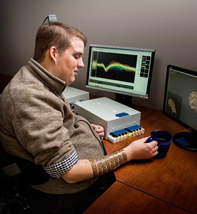 Patient using the Battelle NeuroLife system.